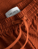 Stan Seersucker Swim Shorts - Court Orange