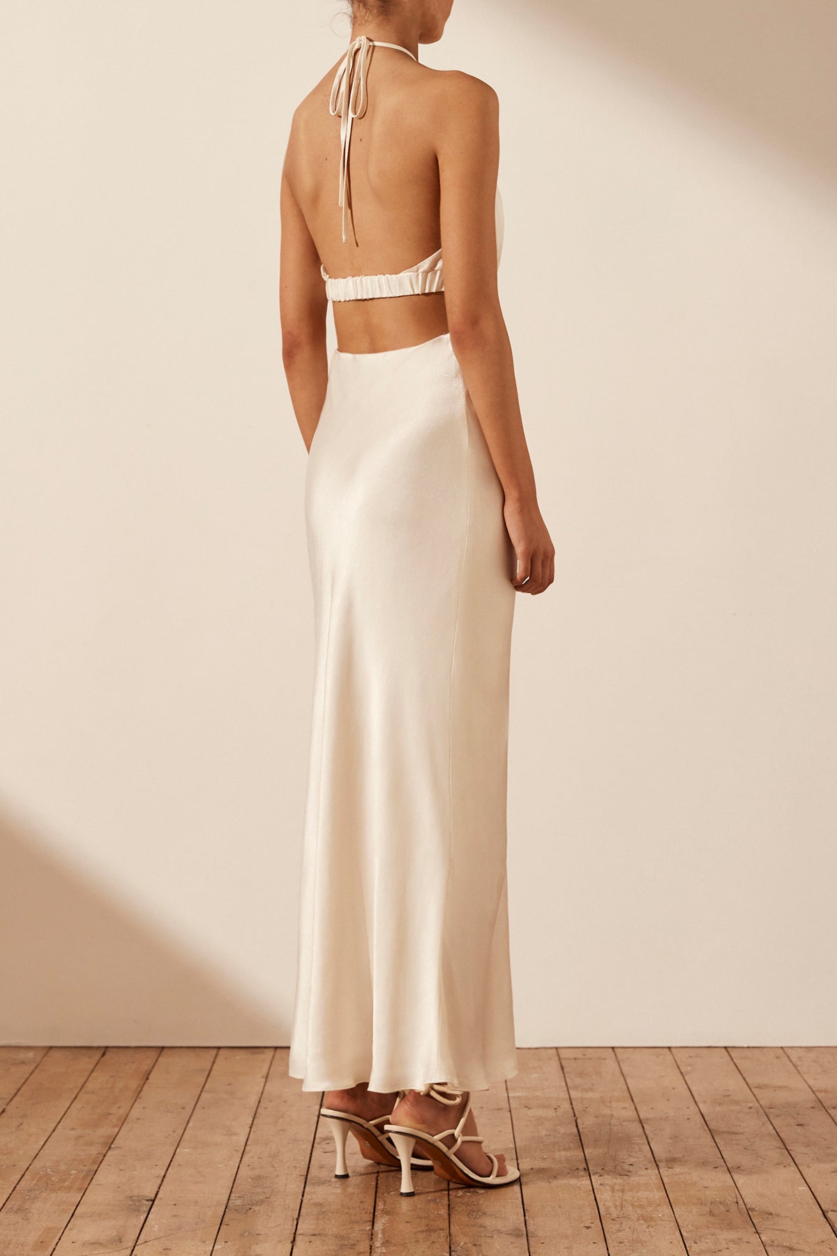 Milo Ruched Open Back Halter Midi Dress - Coconut BLVD Milo Ruched Open Back Halter Midi Dress - Coconut BLVD